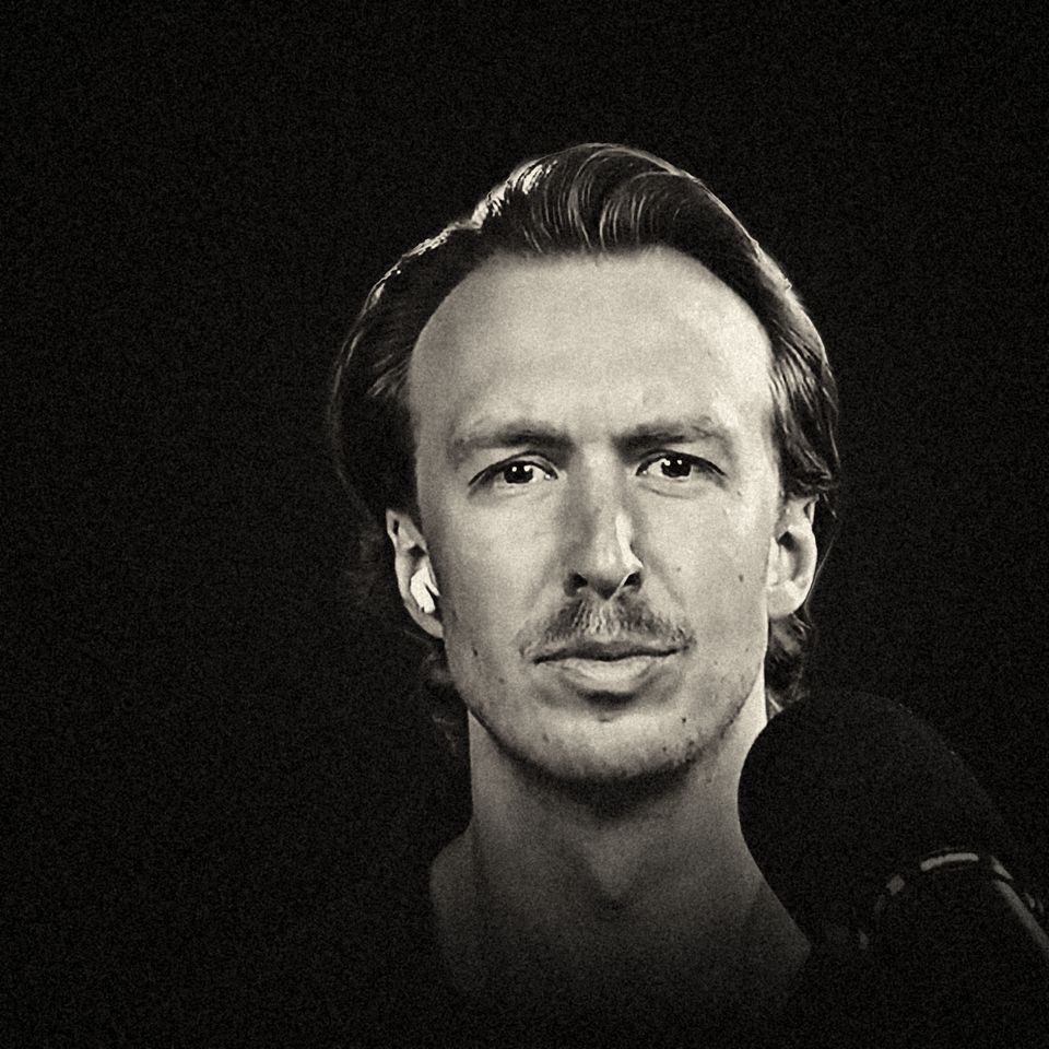 Walker America at the microphone, black and white portrait